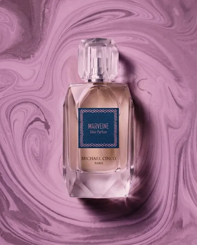 Marveine elixir parfum on a mauve studio field