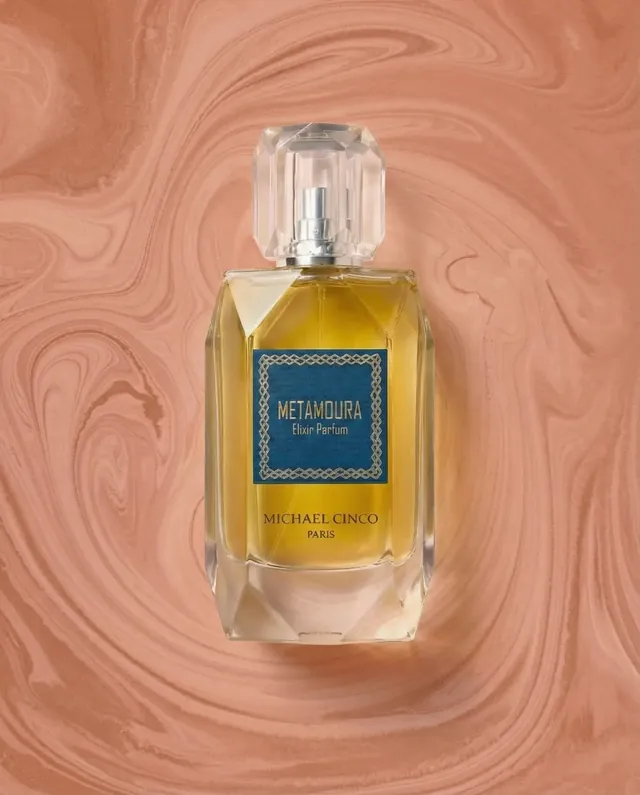 Metamoura elixir parfum on a peach studio field