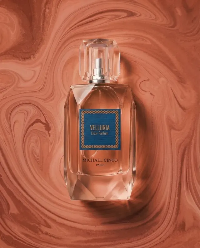 Velluria elixir parfum on a terracotta studio field