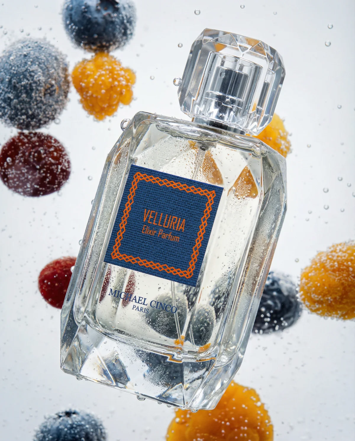 Velluria elixir parfum with berries suspended in water