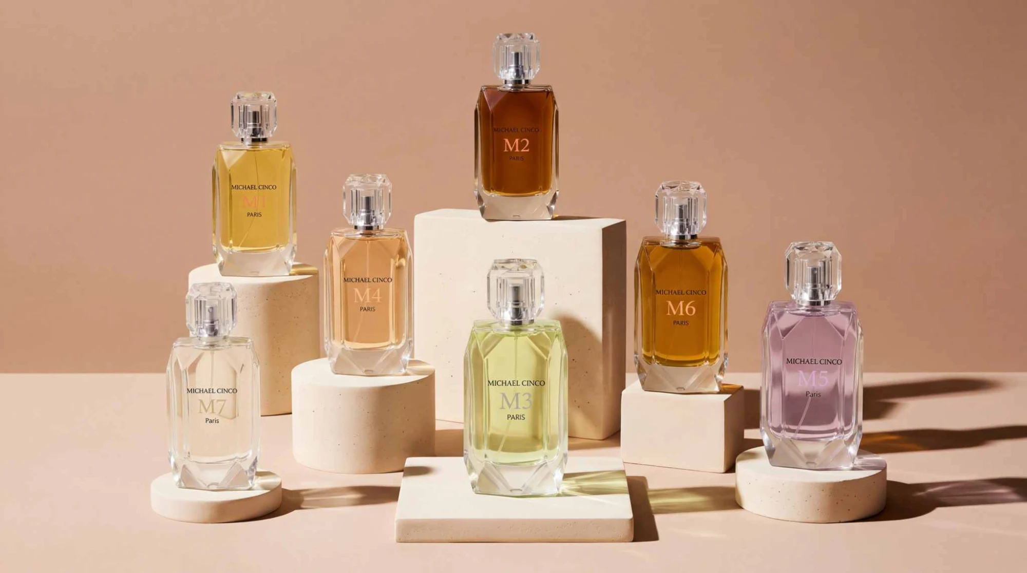 The seven Michael Cinco elixirs on plaster plinths, campaign banner in beige