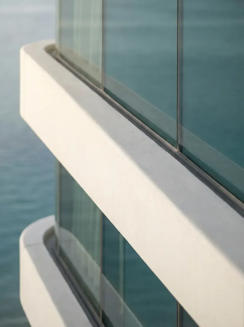 Glass balustrade detail above the water
