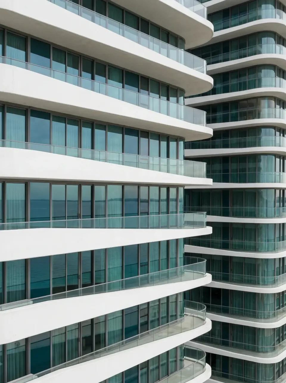 Ribbon balconies in white concrete