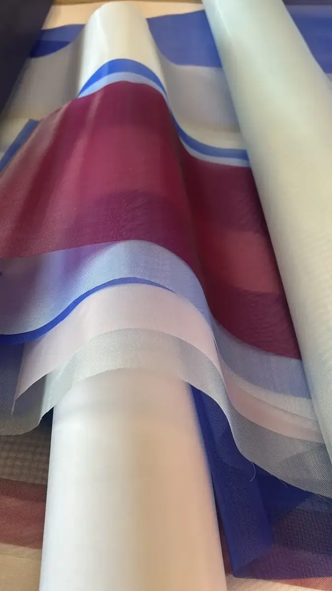 Rolls of dyed mesh